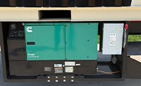 Cummins Onan Commercial QD generator mounted underneath a mobile container structure